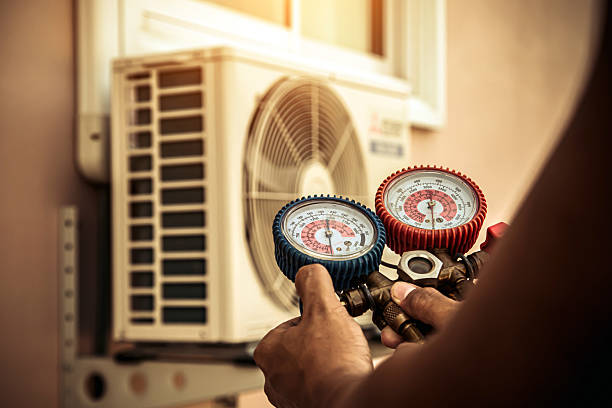 Professional Air Conditioning Service technician working in Woodland Hills, CA
